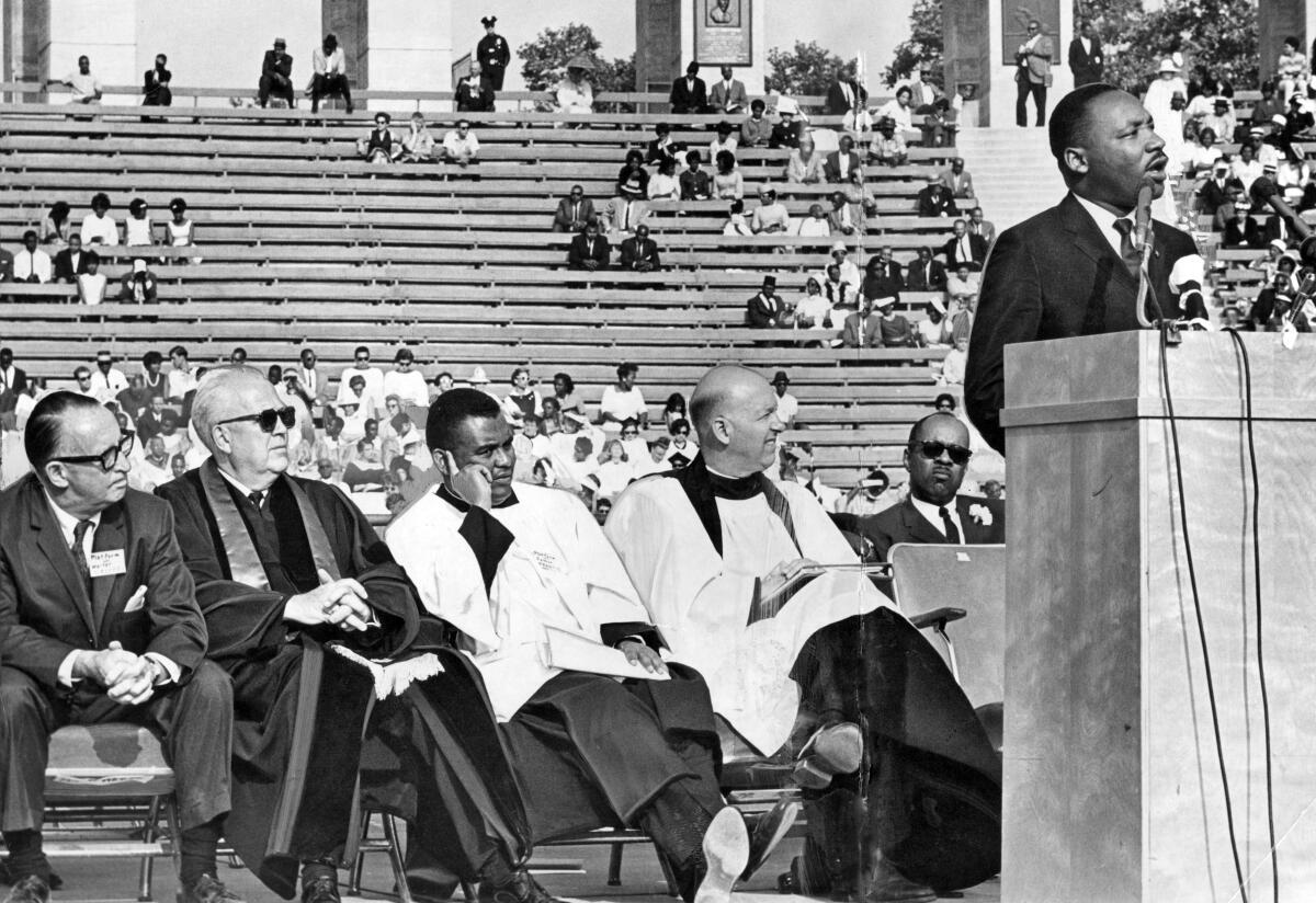 Martin Luther King Jr. speaks at the L.A. Memorial Coliseum in 1964.