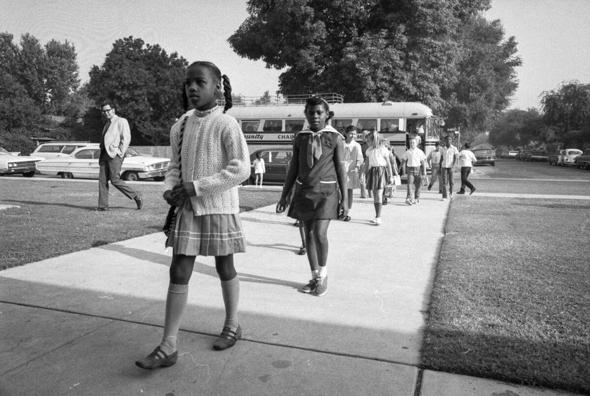 Sep. 10, 1970: First African American students arrive by bus to attend Plymouth Elementary School in Monrovia during first day of integration.