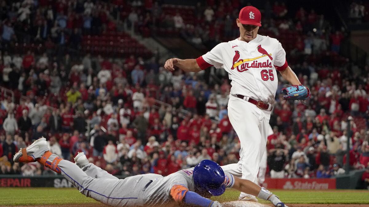 Mets rally with 5 in 9th after Arenado error, beat Cards 5-2