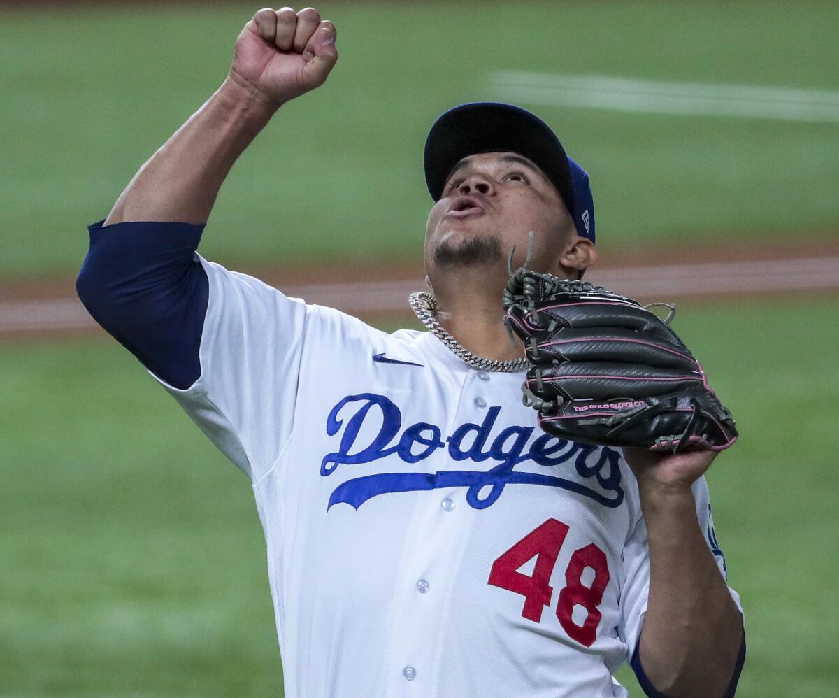 Dodgers reliever Brusdar Graterol celebrates after putting down the Atlanta Braves in order.