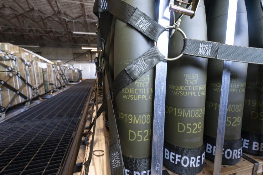 FILE - Pallets of 155 mm shells ultimately bound for Ukraine are loaded by the 436th Aerial Port Squadron, Friday, April 29, 2022, at Dover Air Force Base, Del. President Joe Biden asked Congress on Thursday for $33 billion to bolster Ukraine's fight against Russia, signaling a burgeoning and long-haul American commitment. The Biden administration has announced another $1 billion in new military aid for Ukraine. The Aug. 8 pledge promises what will be the biggest yet delivery of rockets, ammunition and other arms straight from Department of Defense stocks for Ukrainian forces. (AP Photo/Alex Brandon, File)