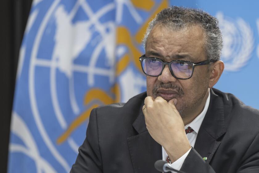 FILE - Tedros Adhanom Ghebreyesus, Director General of the World Health Organization (WHO), speaks to journalists during a press conference at the World Health Organization (WHO) headquarters in Geneva, Switzerland, Thursday April 6, 2023. The head of the U.N. health agency says holiday gatherings and the spread of the most prominent variant globally led to increased transmission of COVID-19 last month. (Martial Trezzini/Keystone via AP, File)