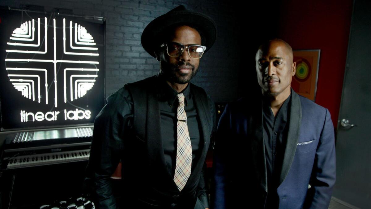 Producers and composers Adrian Younge, left, and Ali Shaheed Muhammad (A Tribe Called Quest) at Younge's Highland Park studio. The duo composed the score for Netflix's new season of Marvel's "Luke Cage" and just released a years-in-the-making studio album.