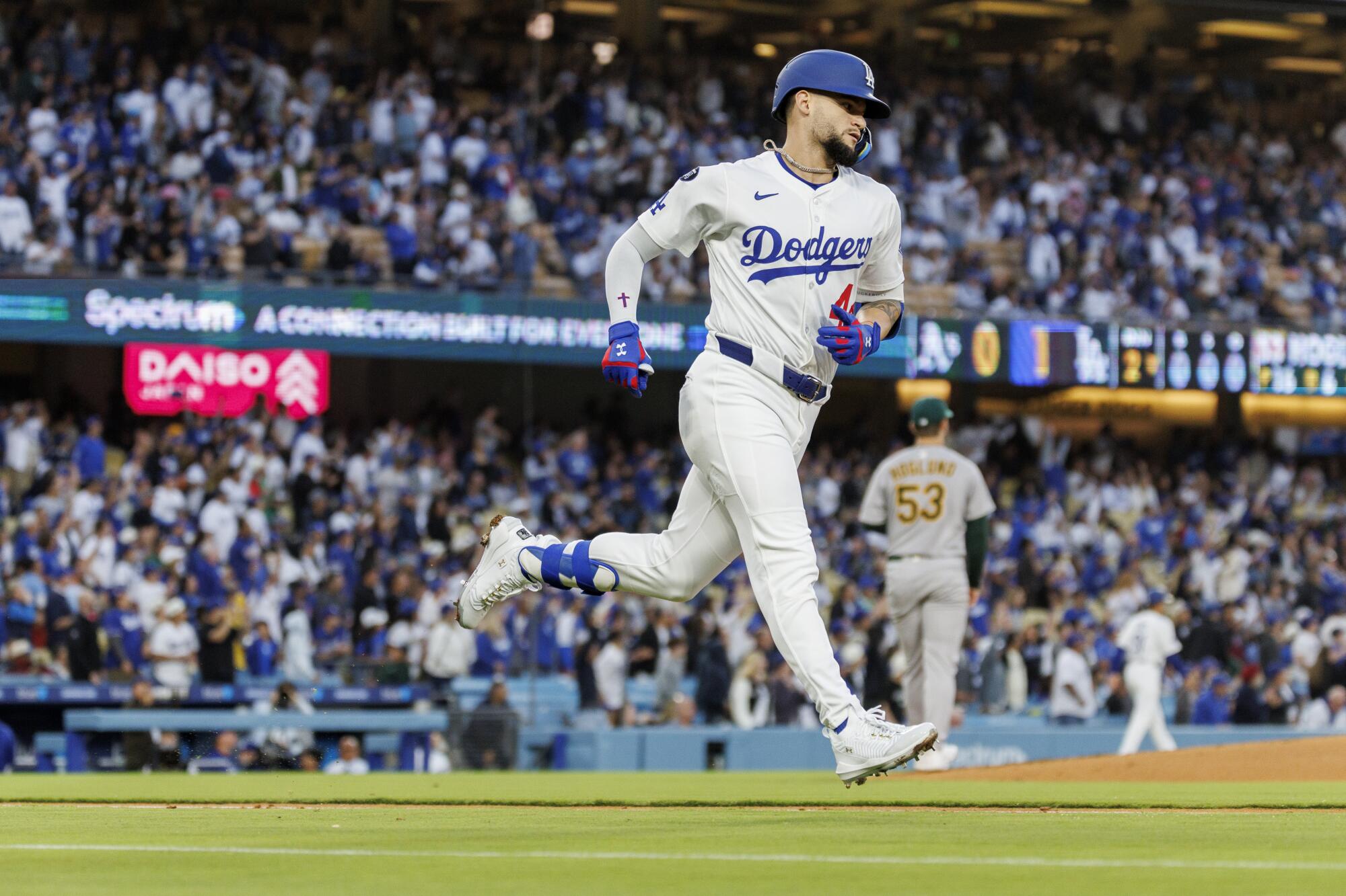 Andy Pages runs the basics after hitting a Home Run solo against athletics at Dodger Stadium on May 14.