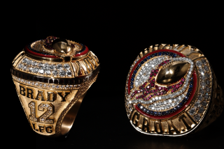 A top and side view of a ring gifted to Tom Brady during his recent Netflix roast. 
