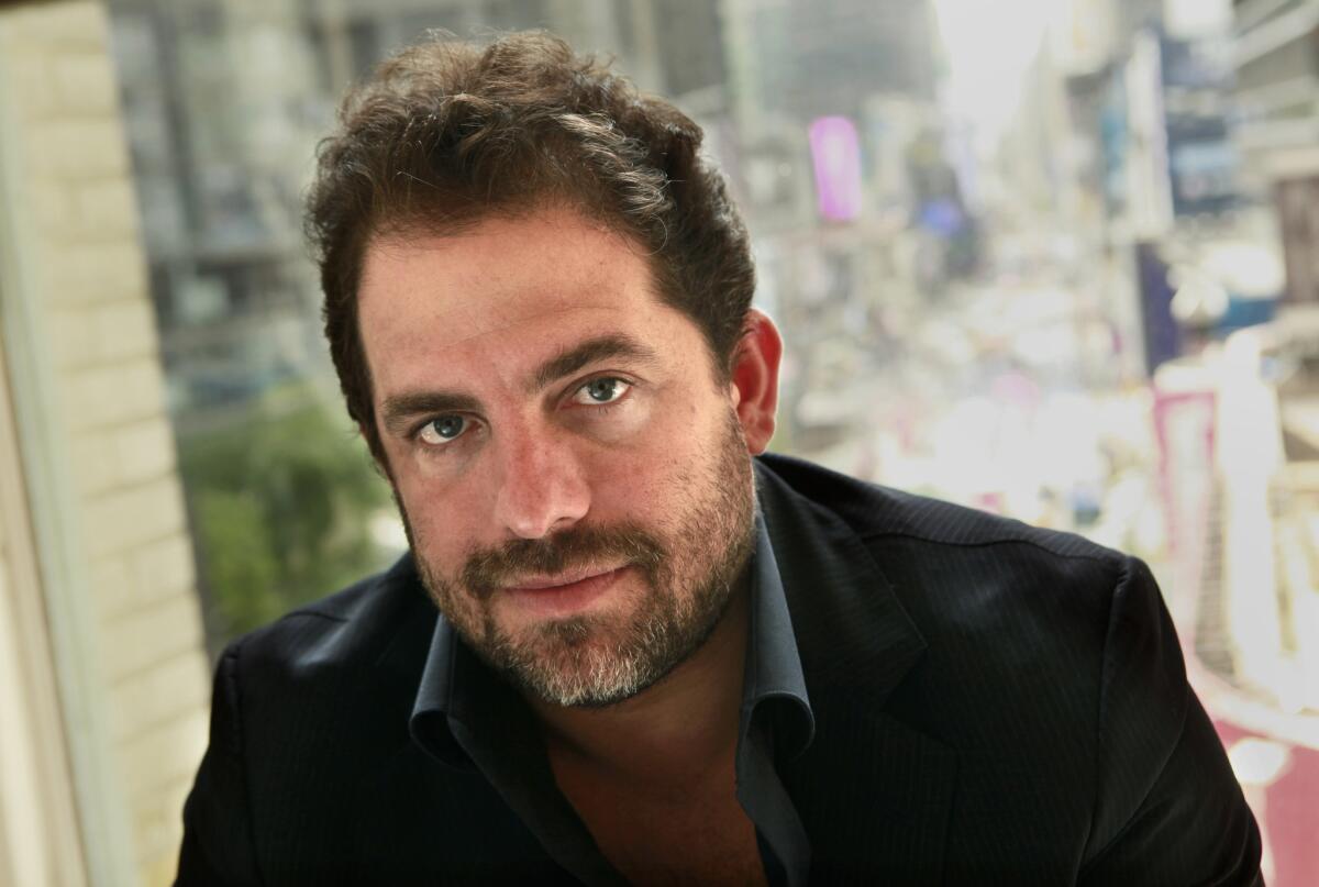 Director Brett Ratner in 2011. A woman being sued by Ratner for defamation after accusing him of rape on a Facebook post said in court filings he is attempting to intimidate and silence women.