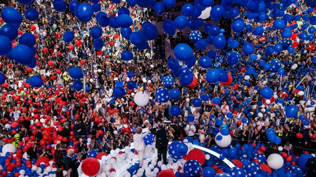 Balloons and confetti fall on Hillary Clinton and Tim Kaine at the end of the Democratic National Convention in Philadelphia, Pa., on July 28, 2016. Democrats aren't looking for a repeat performance, a new poll indicates.