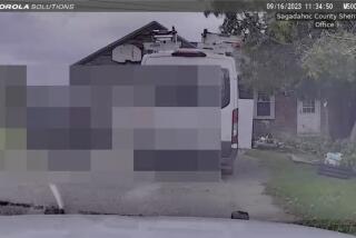 This still image from Sagadahoc County Sheriff’s Office shows dash camera video from Sept. 16, 2023 as police approach Robert Card's father's house. Police feared confronting the Army reservist prior to the worst mass shooting in state history would “throw a stick of dynamite on a pool of gas,” according to footage released by law enforcement. The videos were released to the Portland Press Herald and then sent to The Associated Press on Friday, Dec. 22. (Sagadahog County Sheriff's office/Portland Press Herald via AP)