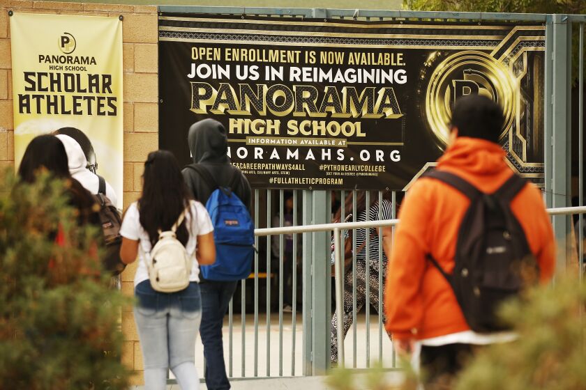 LOS ANGELES, CA - JULY 22, 2019 - Students and parents arrive for summer session at Panorama High School in the San Fernando Valley located at 8015 Van Nuys Blvd, Panorama City on Monday morning July 22, 2019 after learning that suspects in an alleged MS-13 murder were apparently attending Panorama High School. Student Brayan Andino was killed in Dec. 2017. (Al Seib / Los Angeles Times)