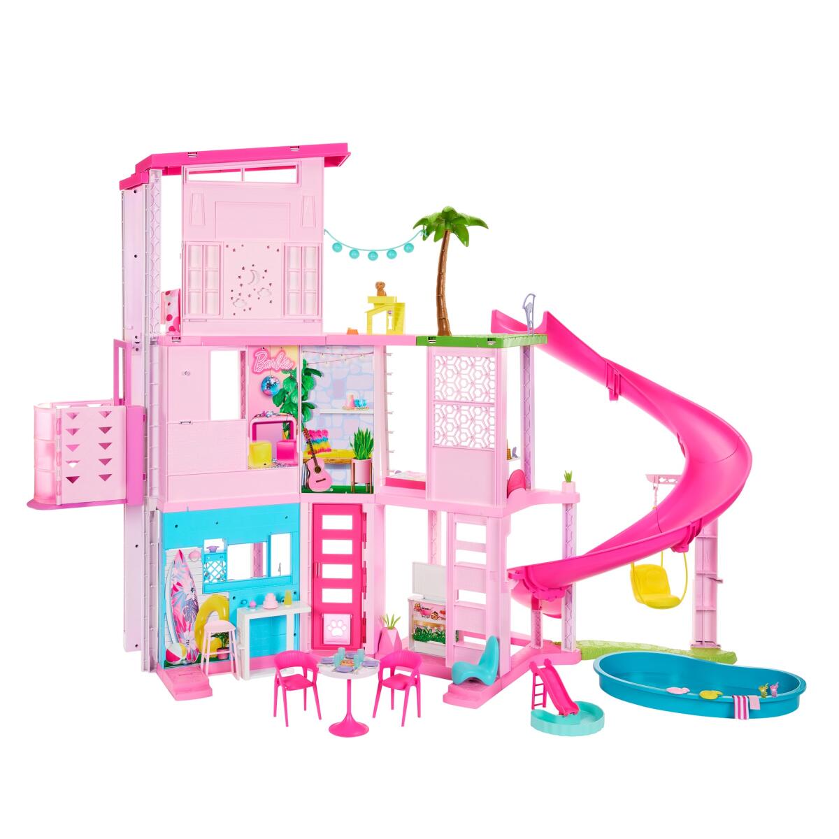 A three-story contemporary-style dollhouse is rendered in pink with a bright slide, a palm tree and swimming pool