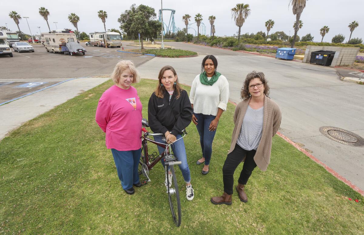 Katheryn Rhodes, Regina Sinsky-Crosby, Paige Hernandez and Caryn Blanton want a safe parking lot for homeless people.