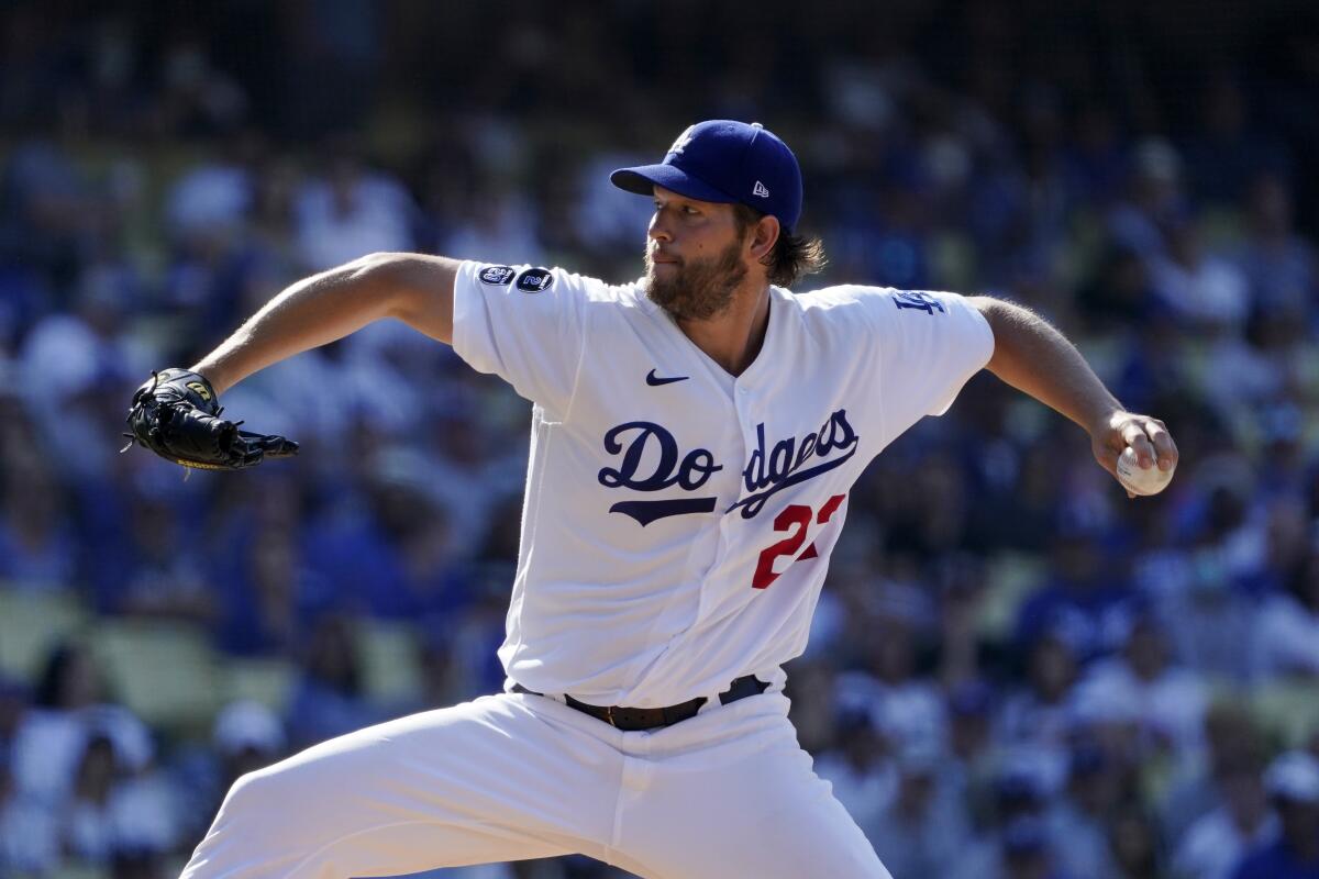 Los Angeles Dodgers starting pitcher Clayton Kershaw throws to the plate during the third inning.