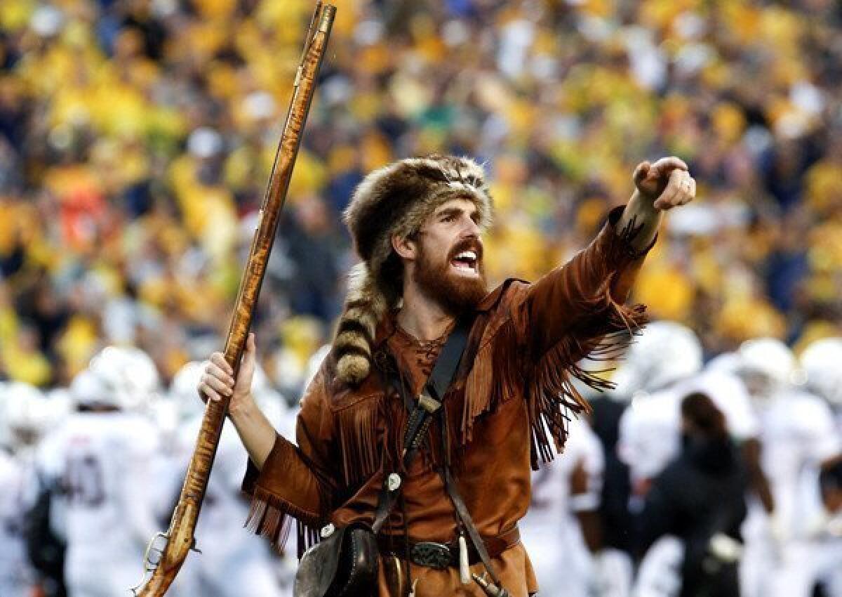 Mountaineer mascot Jonathan Kimble fires up fans during a game earlier this season.