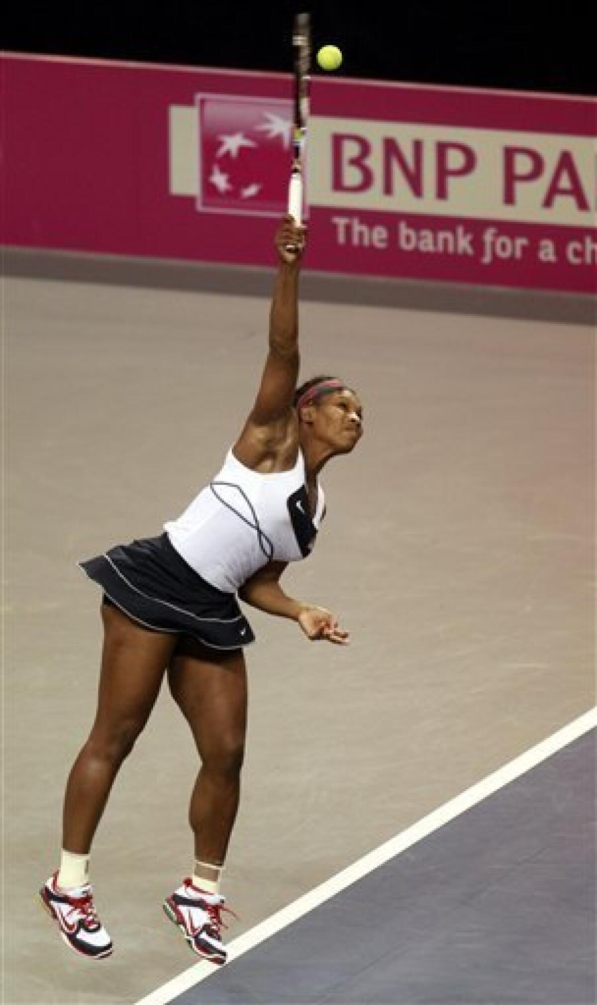 Serena Williams serves during a first-round Fed Cup tennis match against Anastasia Yakimova, of Belarus, in Worcester, Mass., Sunday, Feb. 5, 2012. (AP Photo/Steven Senne)