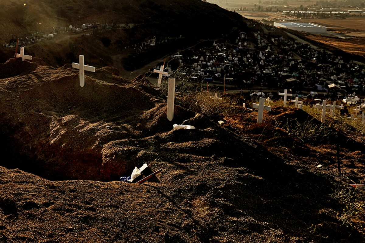 Crosses mark a mass grave in Tijuana.
