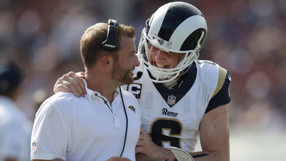 Rams coach Sean McVay, left, talks with punter Johnny Hekker during a game against the Indianapolis Colts on Sept. 10.