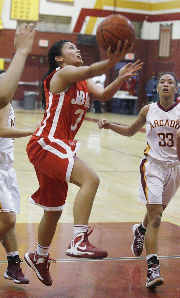 Photo Gallery: Burroughs v. Arcadia Pacific League girls basketball