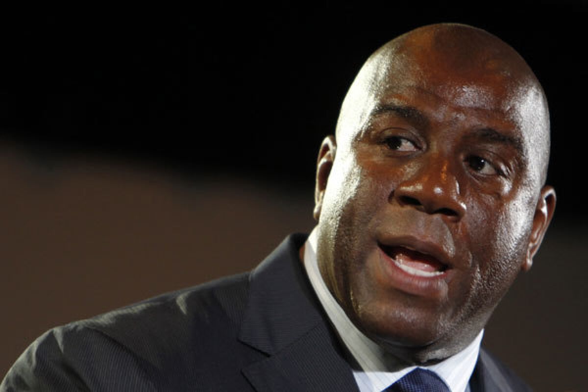 Magic Johnson will invest millions of his own into buying the Dodgers, but how much time will he invest?