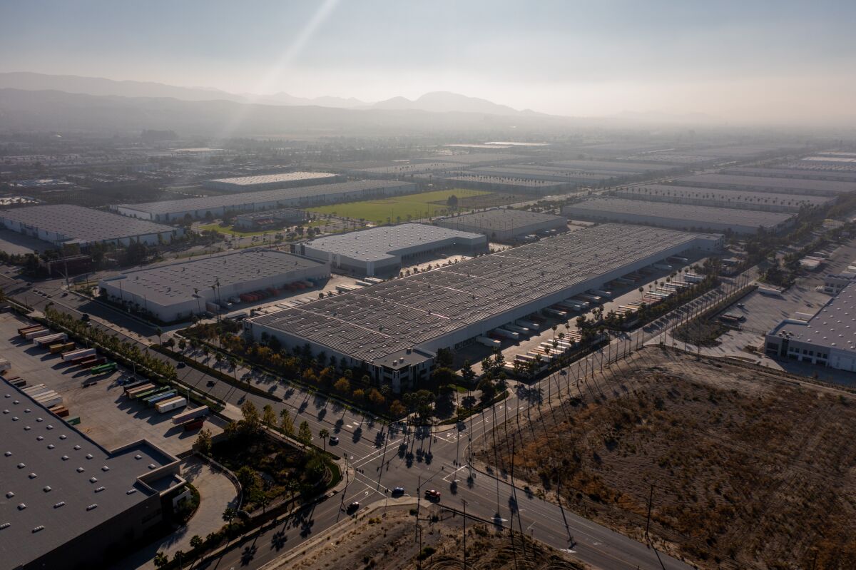 Warehouses are lined up as far as the eye can see.