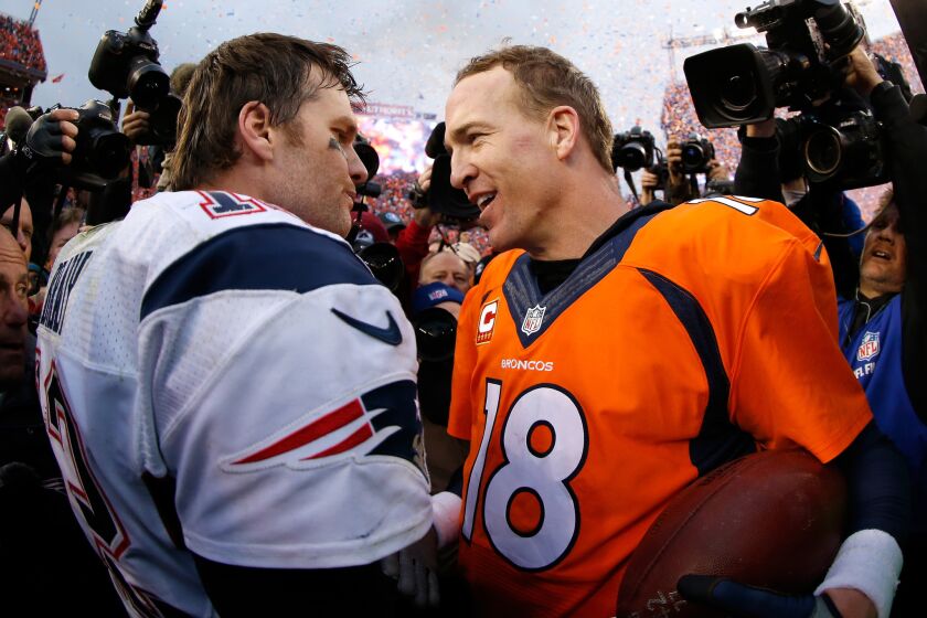 Denver's Peyton Manning and New England's Tom Brady speak after the AFC championship game on Sunday.