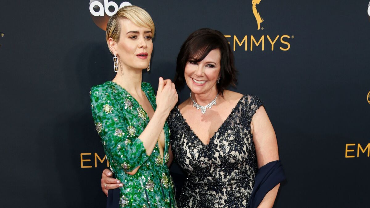 Sarah Paulson, left, and Marcia Clark on the red carpet before the Emmys ceremony in downtown L.A.