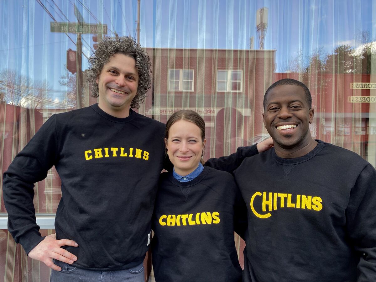You can buy sweatshirts too, here worn by (left to right) Chef Edouardo Jordan, Emily Beck and Will Klintberg.