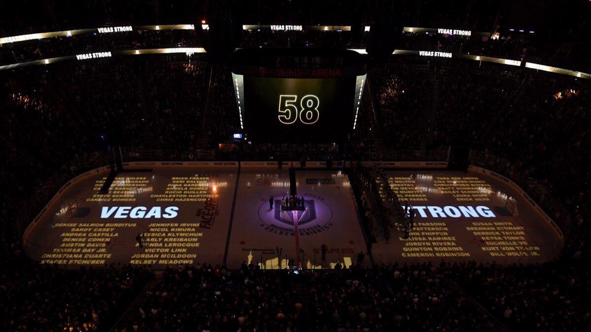 The names of the 58 people killed at the Route 91 Harvest country music festival are projected on the ice before the Vegas Golden Knights' inaugural regular-season home opener against the Arizona Coyotes at T-Mobile Arena on Tuesday.