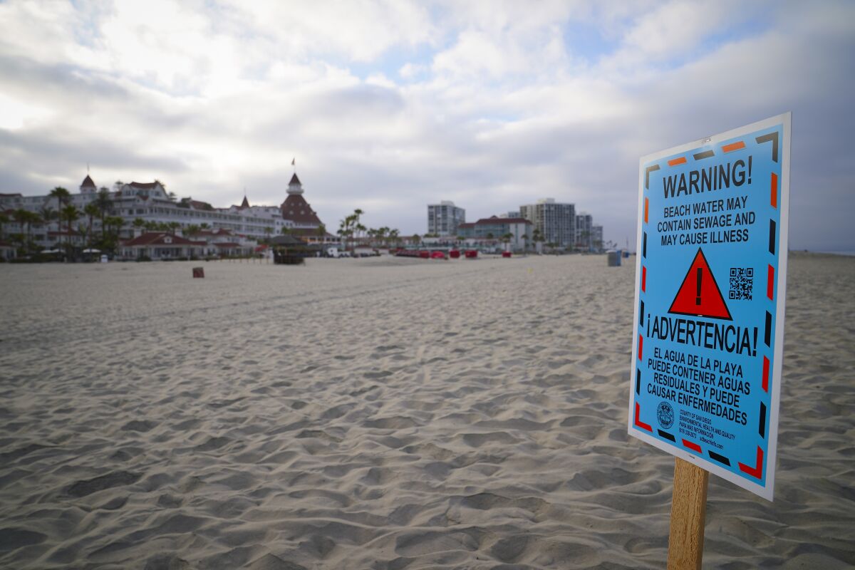 Signs warning of sewage pollution were posted on Saturday, July 2, 2022 in Coronado, CA. 
