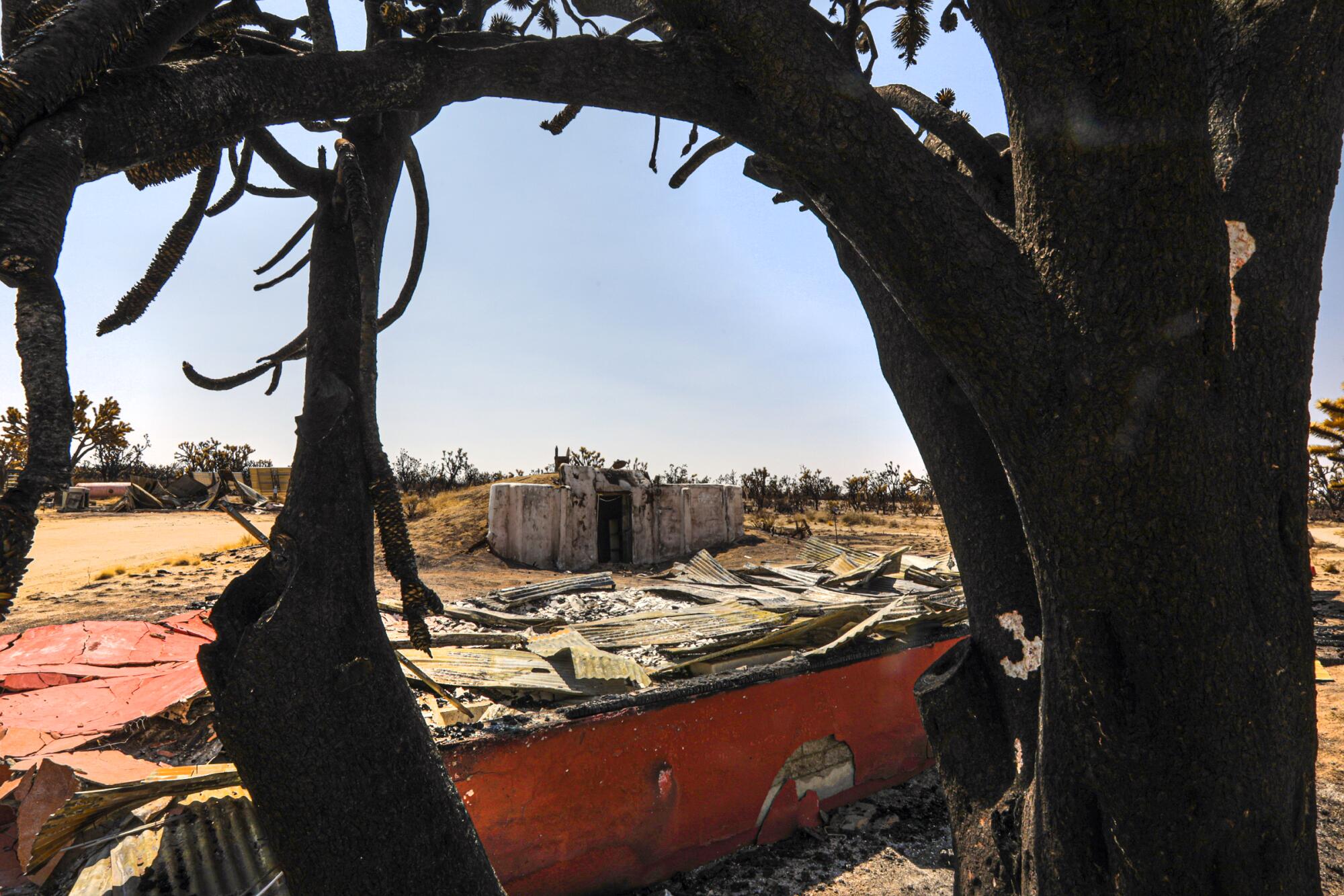 An adobe bunkhouse at Valley View Ranch burned when the Dome fire swept through the Mojave National Preserve.