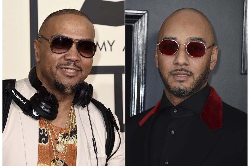 This combination photo shows Timbaland at the 58th annual Grammy Awards in Los Angeles on Feb. 15, 2016, left, and Swizz Beatz at the 61st annual Grammy Awards in Los Angeles. The producers host a competition series “Verzuz.” The performances are streamed by artists usually from their homes on Instagram Live, which has become one of the go-to outlets for musicians to reach their fans as many across the world are home due to the coronavirus pandemic. Timbaland and Swizz kicked off the series, followed by other notable matchups like The-Dream and Sean Garrett, Ne-Yo and Johntá Austin, Scott Storch and Mannie Fresh, as well as T-Pain and Lil Jon which drew more than 280,000 live viewers. (Photos by Jordan Strauss/Invision/AP)