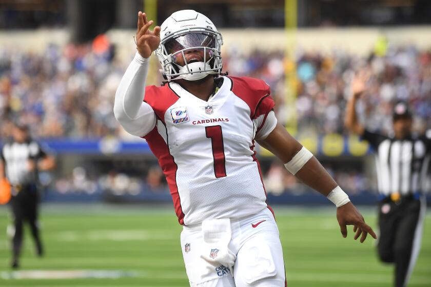 Inglewood, CA. October 3, 2021: Cardinals quarterback Kyler Murray celebrates his first down run against the Rams in the second quarter at SoFi Stadium Sunday. (Wally Skalij/Los Angeles Times)