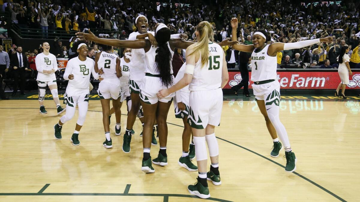 Baylor players celebrate after a 68-57 victory over No. 1 Connecticut.