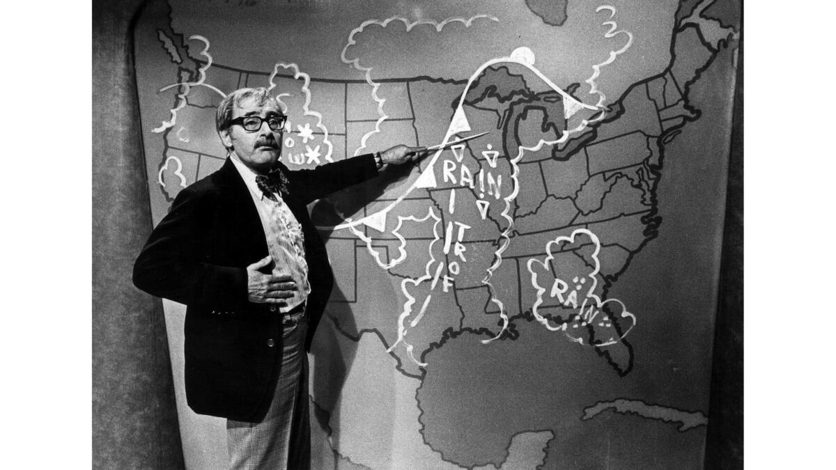 Oct. 26, 1978: Dr. George Fischbeck, Channel 7 meteorologist, is a former teacher and artist who now lectures in a television studio and uses a paintbrush on the weather board.