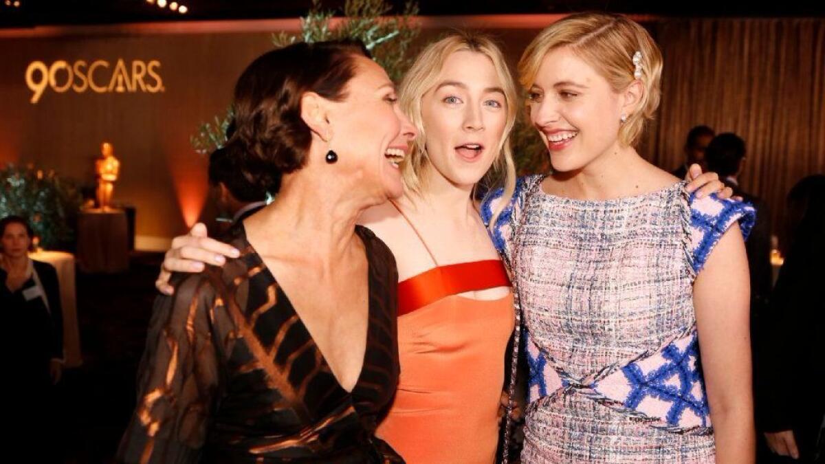 Saoirse Ronan, nominated for Best Actress, center, with Laurie Metcalf, left, nominated for Supporting Actress, and Greta Gerwig, right, nominated for Directing and Original Screenplay during the Nominees Luncheon for the 90th Oscars in the Beverly Hilton Grand Ballroom.