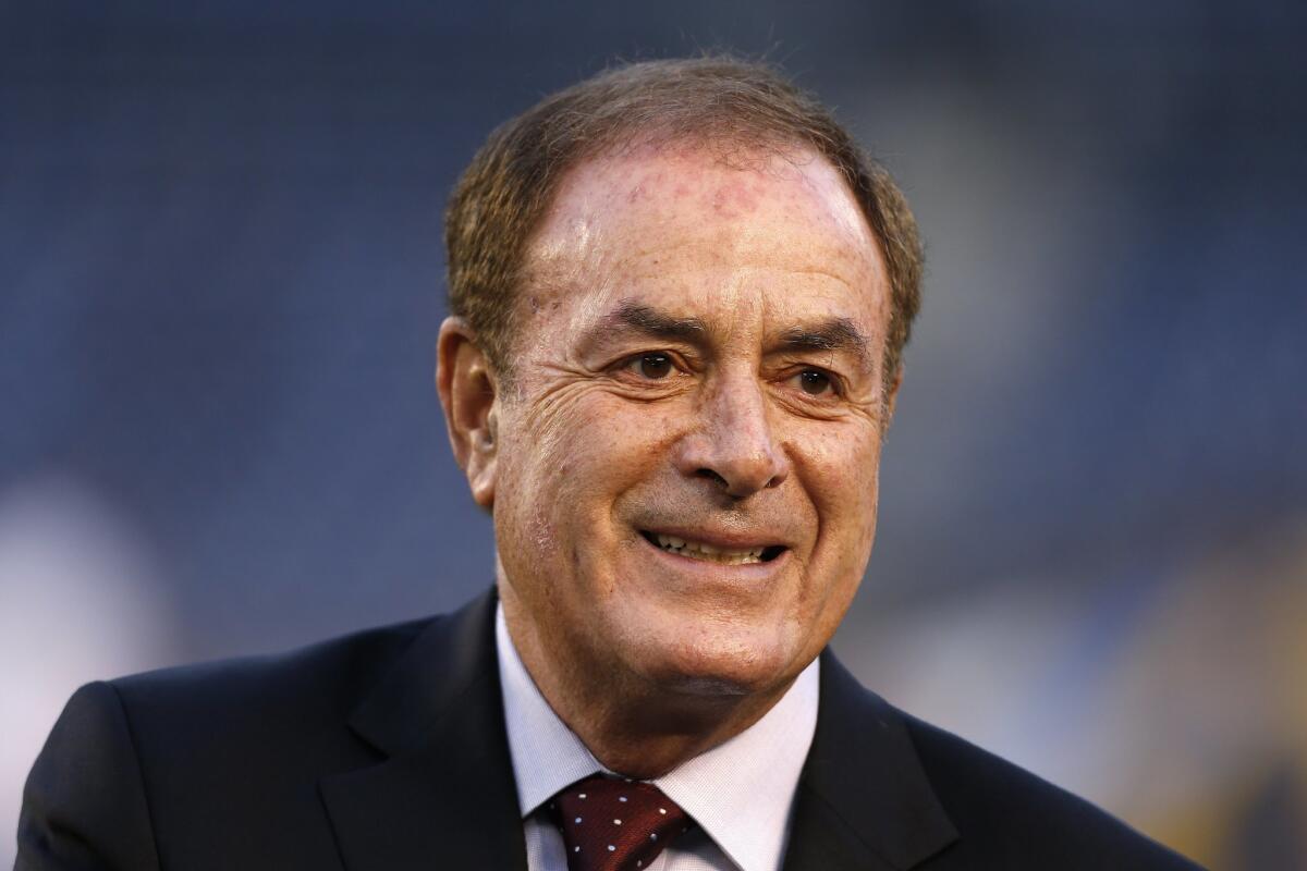 Broadcaster Al Michaels stands on the field before a game between the New England Patriots and San Diego Chargers on Dec. 7, 2014, at Qualcomm Stadium.