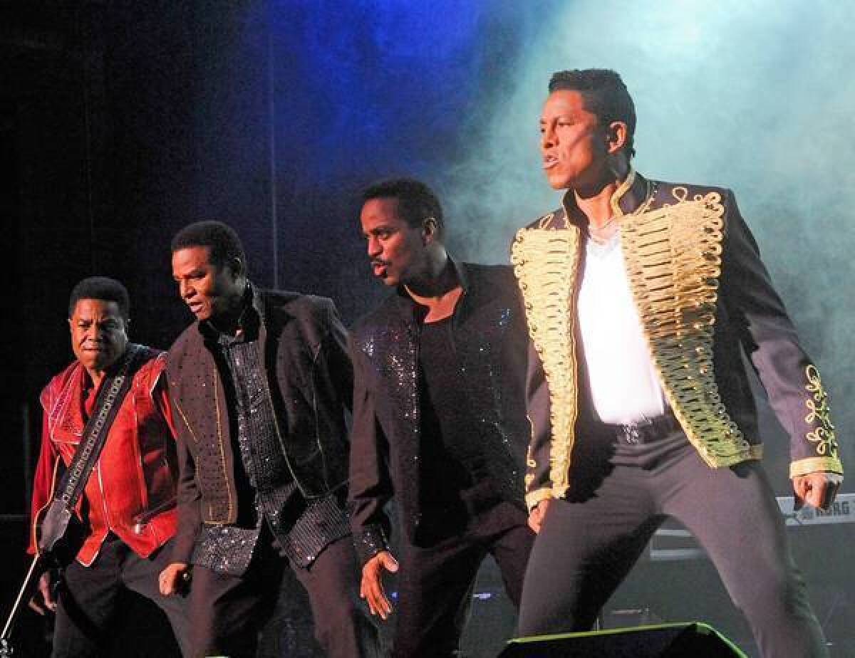 The Jackson 4 -- from left, Tito, Jackie, Marlon and Jermaine -- perform at Bergen Performing Arts Center on June 30, 2012, in Englewood City, N.J.
