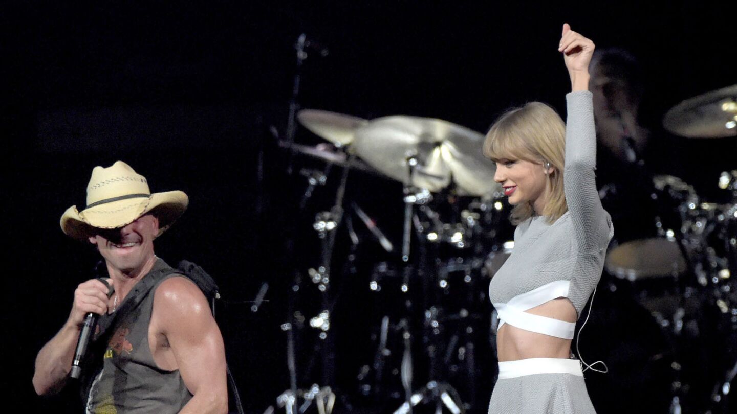 Taylor Swift joined Kenney Chesney onstage during his Big Revival tour kick-off for a 55-show run. It was at this concert that Swift was spotted in the arms of musician Calvin Harris, sparking rumors the two were dating.