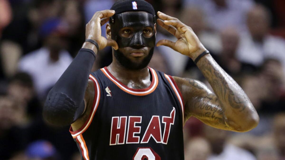 Chris Bosh has some fun with LeBron James' mask - Los Angeles Times