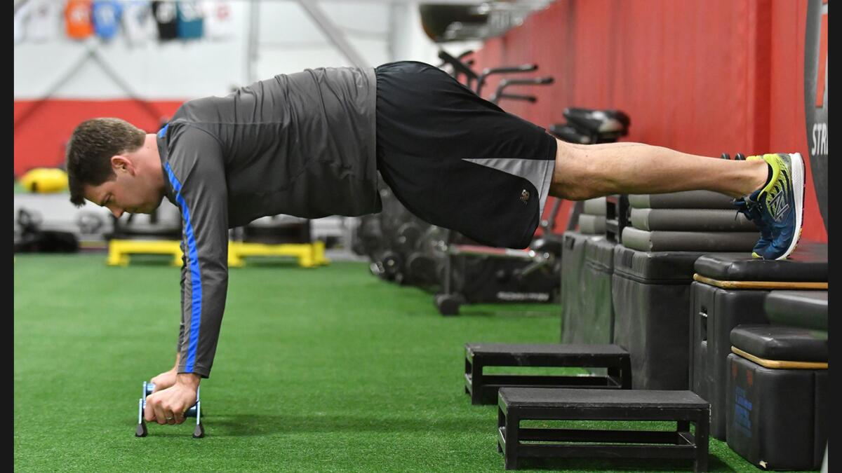 Dodgers pitcher Rich Hill works out at a gym in Woburn, Mass., on Jan. 18.