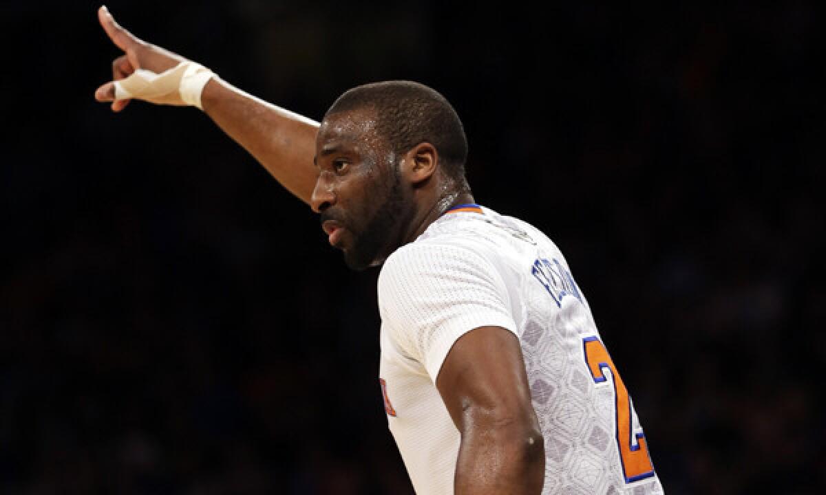 New York Knicks point guard Raymond Felton reacts after scoring during the first half of the team's 106-100 loss to the Cleveland Cavaliers on Sunday.