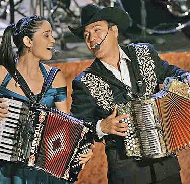 Veteran norteña band Los Tigres del Norte perform at the awards ceremony in Los Angeles.