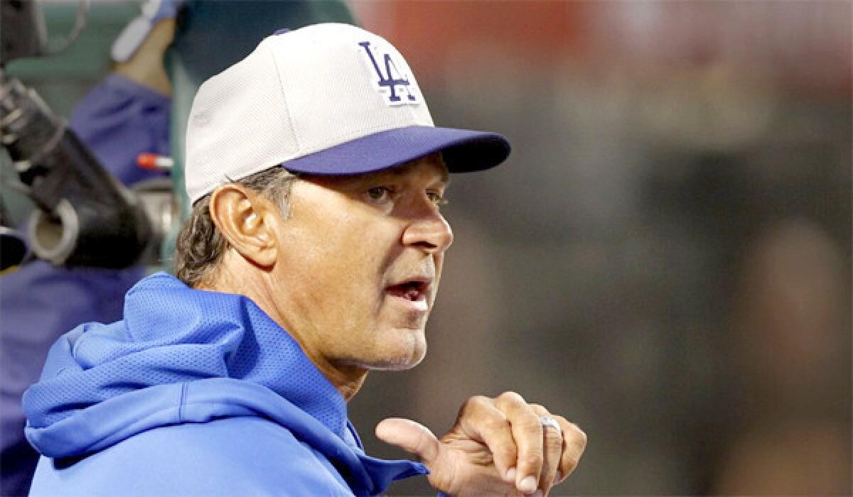 Dodgers Manager Don Mattingly says his job was in jeopardy when the team was slumping earlier this season.