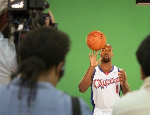 Point guard Baron Davis, one of the new additions to the Clippers, poses for a photo shoot during Media Day on Monday at their new facility in Playa Vista.