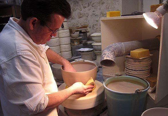 An employee works on a bowl at the earthenware factory in Gien, France, which was founded in 1821. The glazed earthenware is known as faience, and among the French aristocracy was a discreet symbol of prestige and good taste. But for the last few decades, the faience of Gien has also become a symbol of a lifestyle that is a vanishing art.