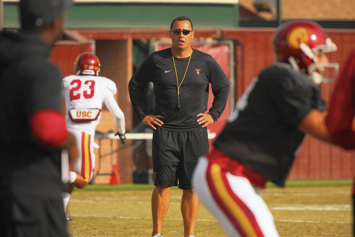 Steve Sarkisian, then head coach at USC, looks on during a practice at Howard Jones Field on Aug. 25, 2015.