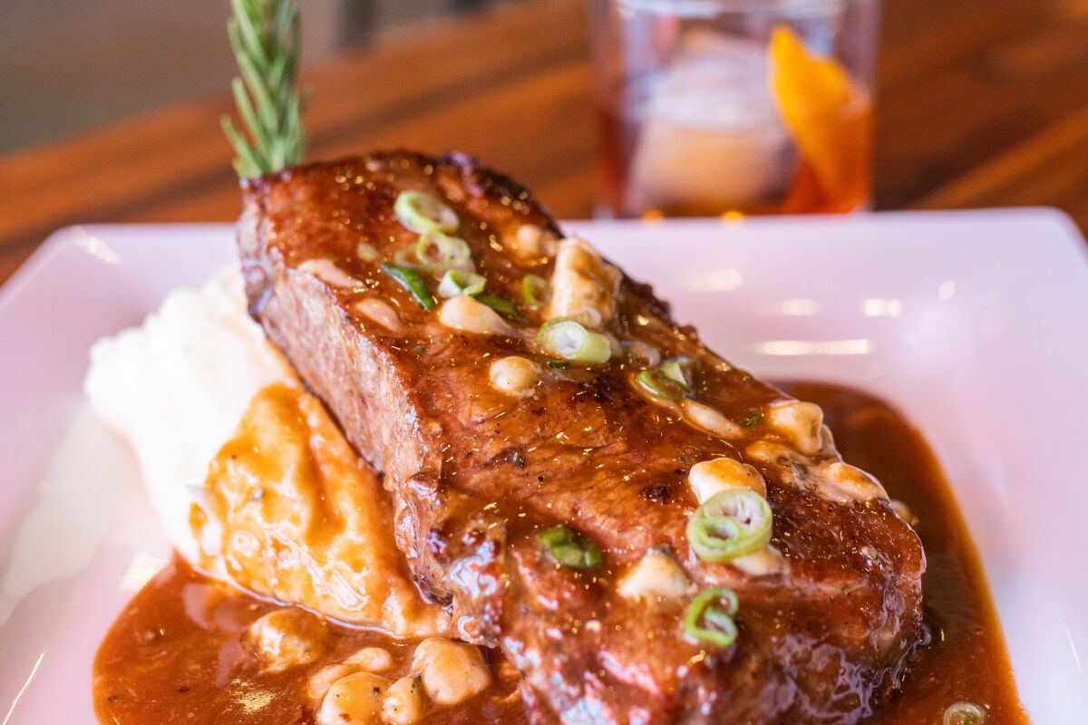 Liberty Calls Distilling's $20 date night steak night special is a 12-ounce New York steak and an old fashion.
