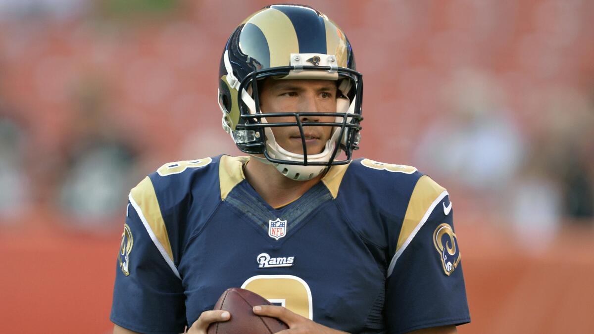 The St. Louis Rams quarterback Sam Bradford warms up before a game against the Cleveland Browns in August 2014. Bradford was traded to the Philadelphia Eagles on Tuesday.