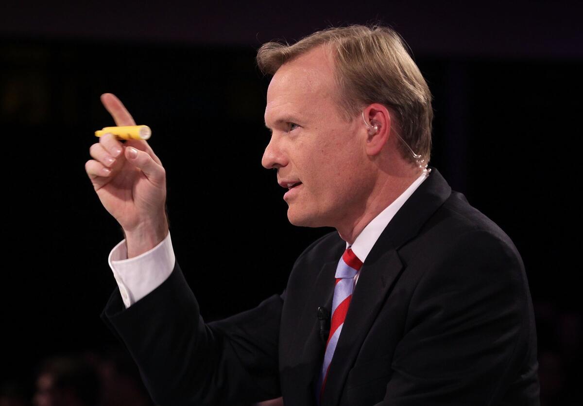"Face the Nation" anchor John Dickerson speaks before the Democratic Party's second presidential debate.