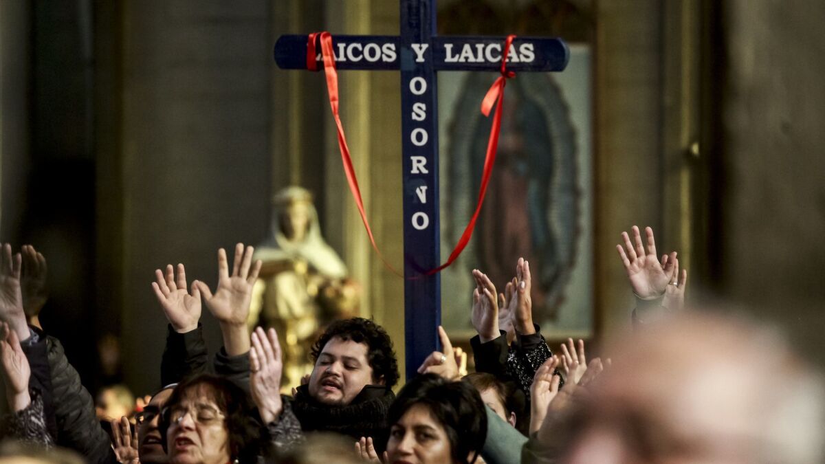 Catholics worship at the San Mateo cathedral in Osorno, Chile, on June 17, 2018.