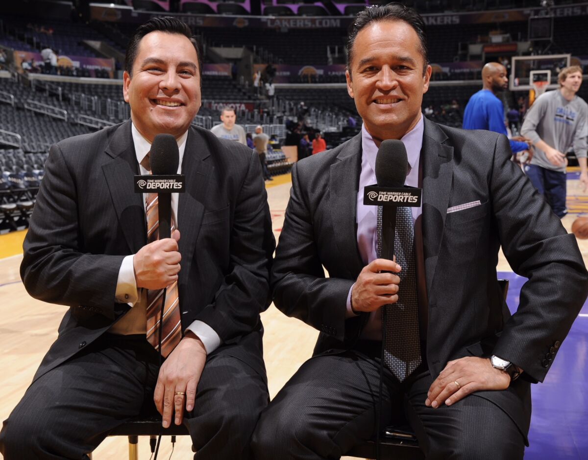 Sports announcers Adrian Garcia Marquez, left, and Francisco Pinto.